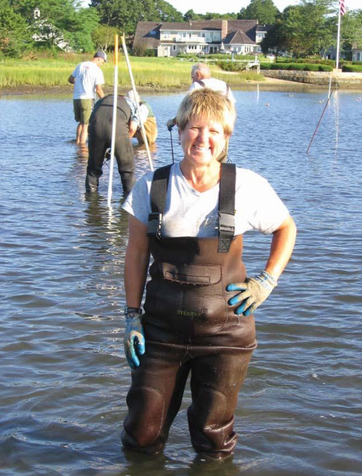 Picture of Kris Clark in her waders at an oyster farm