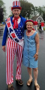 Kris and her husbank Lenny dressed as Captain America at the Barnstable 4th of July parade 2023